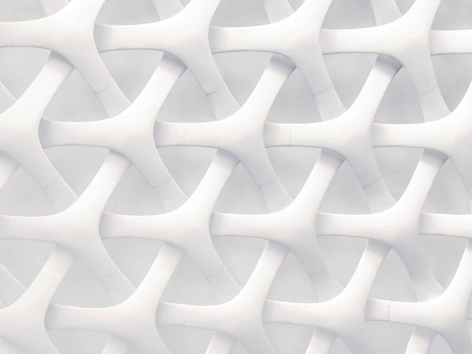 Abstract interwoven white geometric pattern representing complexity and Christian counselling formation