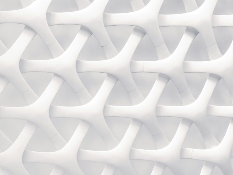 Abstract interwoven white geometric pattern representing complexity and Christian counselling formation